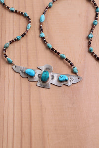 thunderbird bird power boho bohemian pluma feather stamped beaded shell Silver sterling silver moon ring necklace handmade crystal point turquoise made beads naja native American jewelry healing power labradorite pendant 